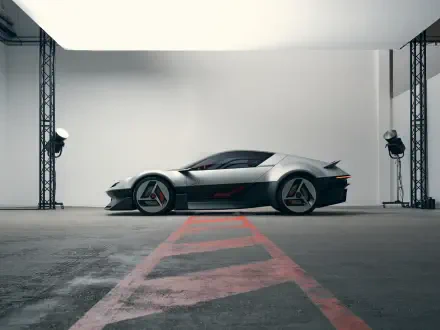 Alpine A310 Vision concept sports car in a modern studio, featured in a 5K Ultra HD desktop wallpaper and background.