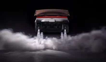 Tesla Roadster launching through clouds of smoke, 2K Quad HD PC desktop wallpaper and background.