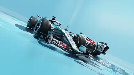 Haas F1 Team VF-26 race car speeding across a blue track, HD desktop wallpaper and background.
