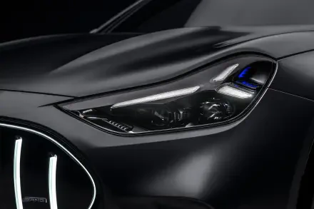 Mercedes-AMG GT SUV headlight close-up in a 2K Quad HD desktop wallpaper and background.