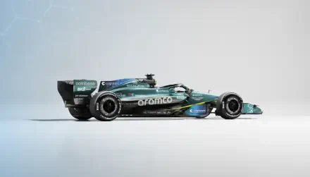 Aston Martin AMR26 F1 race car in side profile on a clean white backdrop, featured in a 2K Quad HD PC desktop wallpaper and background.