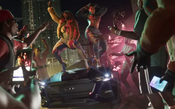 4K Ultra HD PC desktop wallpaper: Grand Theft Auto VI video game scene by Real Dimez — two dancers on a car hood amid neon city chaos as onlookers film with phones.