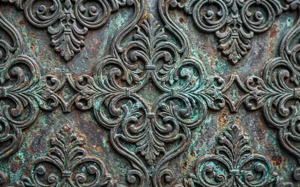 5K Ultra HD PC desktop wallpaper & background — close-up vintage ornamental metal pattern with green patina, rust and intricate scrollwork.