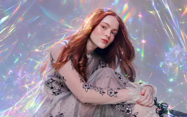 I don't know who this is. Alt: 4K Ultra HD PC desktop wallpaper — red-haired woman in a sheer floral dress seated against an iridescent, prismatic backdrop, contemplative expression.