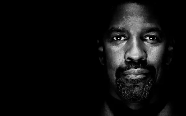 Black-and-white high-contrast close-up of a man's face emerging from darkness, cinematic safe house 4K Ultra HD PC desktop wallpaper/background.