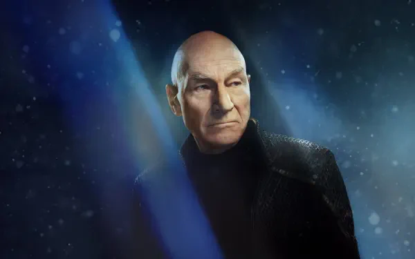 Star Trek: Picard 4K Ultra HD PC desktop wallpaper — brooding bald Starfleet captain in black uniform gazes through blue starlit nebula.
