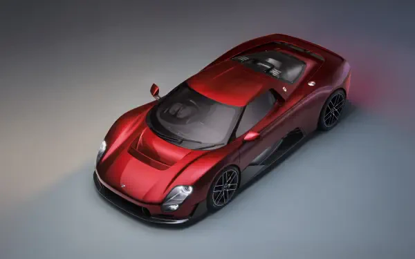 Top-down view of a red McLaren McL 6GT sports car in 8K Ultra HD, rendered as a PC desktop wallpaper and background.
