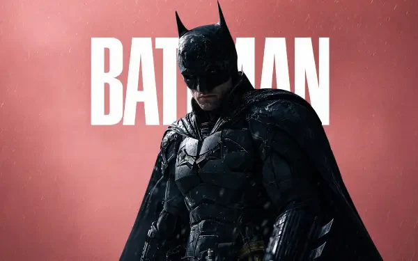 Armored Batman in moody lighting before bold BATMAN text on a red backdrop — 4K Ultra HD PC desktop wallpaper and background.