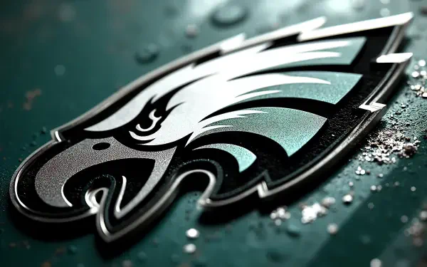 Philadelphia Eagles NFL logo close-up on a textured metallic green surface — 4K Ultra HD PC desktop wallpaper background