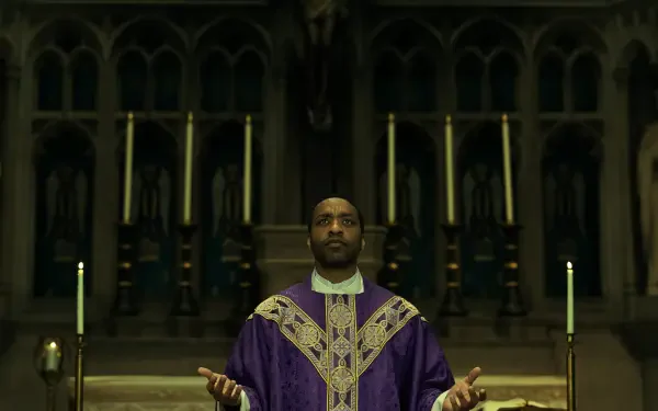 Chiwetel Ejiofor as a priest in a church in The Exorcist: Martyrs, 4K Ultra HD desktop wallpaper.