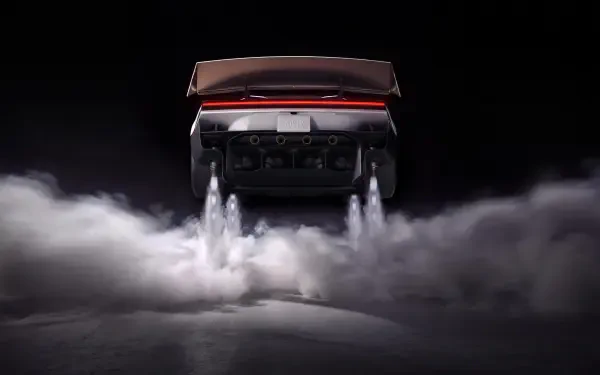 Tesla Roadster launching through clouds of smoke, 2K Quad HD PC desktop wallpaper and background.
