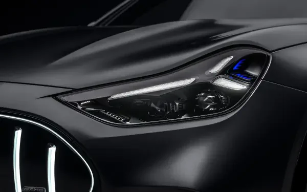 Mercedes-AMG GT SUV headlight close-up in a 2K Quad HD desktop wallpaper and background.
