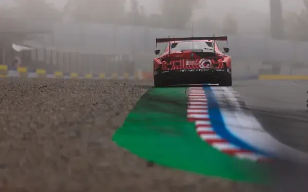 BMW M4 GT3 race car speeding over a wet race track during the FIA World Endurance Championship, HD desktop wallpaper