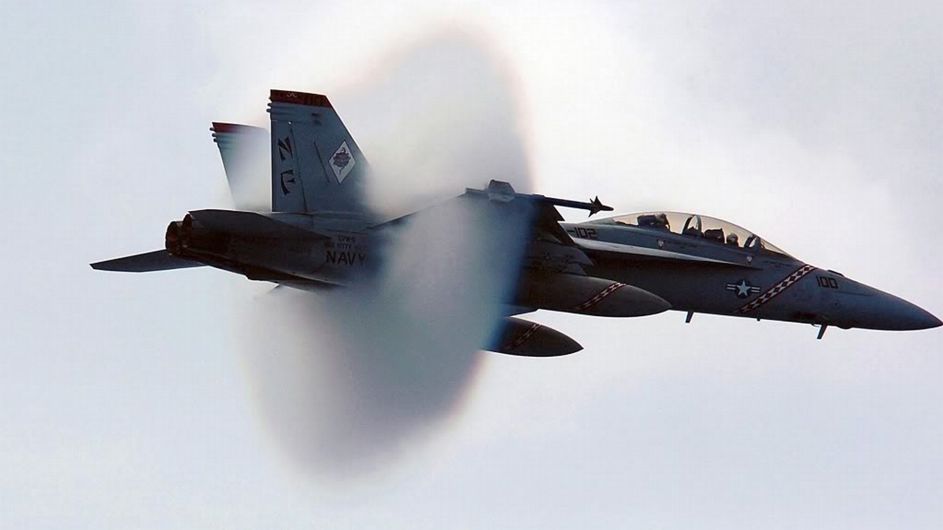 Boeing F/A-18E/F Super Hornet soaring in the sky.