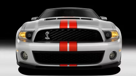 Front view of a silver Ford Mustang with red racing stripes and Cobra emblem — HD PC desktop wallpaper/background.