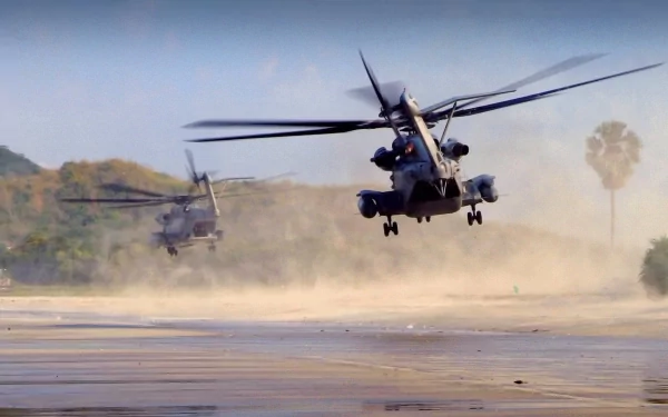 Two Sikorsky CH-53E Super Stallion military helicopters hover low over a dusty landscape, captured in an HD PC desktop wallpaper and background.