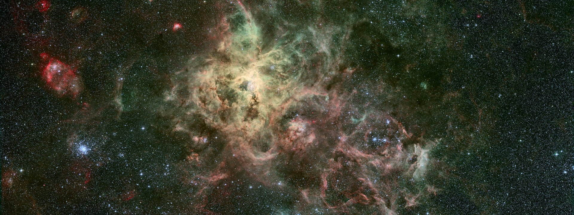 HD desktop wallpaper and background featuring a stunning green and red nebula in a deep space setting, evoking a mesmerizing Sci-Fi atmosphere.