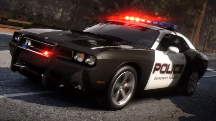 HD PC desktop wallpaper from the video game Need For Speed: Hot Pursuit showing a black and white police car with flashing red and blue lights on a forest road.