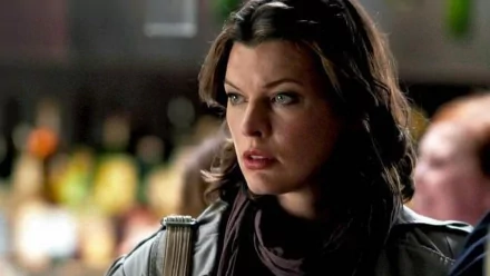 HD PC desktop wallpaper background: cinematic close-up of a tense woman from the movie Faces in the Crowd, moody dimly lit bar scene.