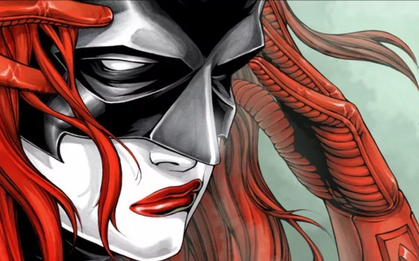 HD comic-style PC desktop wallpaper featuring a close-up of Batwoman with her red hair and mask, showcasing intense expression and detailed artwork.