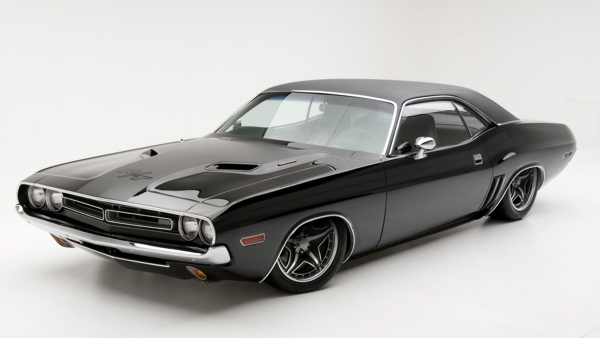 Sleek black vintage muscle car (vehicle, car) on a white studio backdrop — HD PC desktop wallpaper and background.