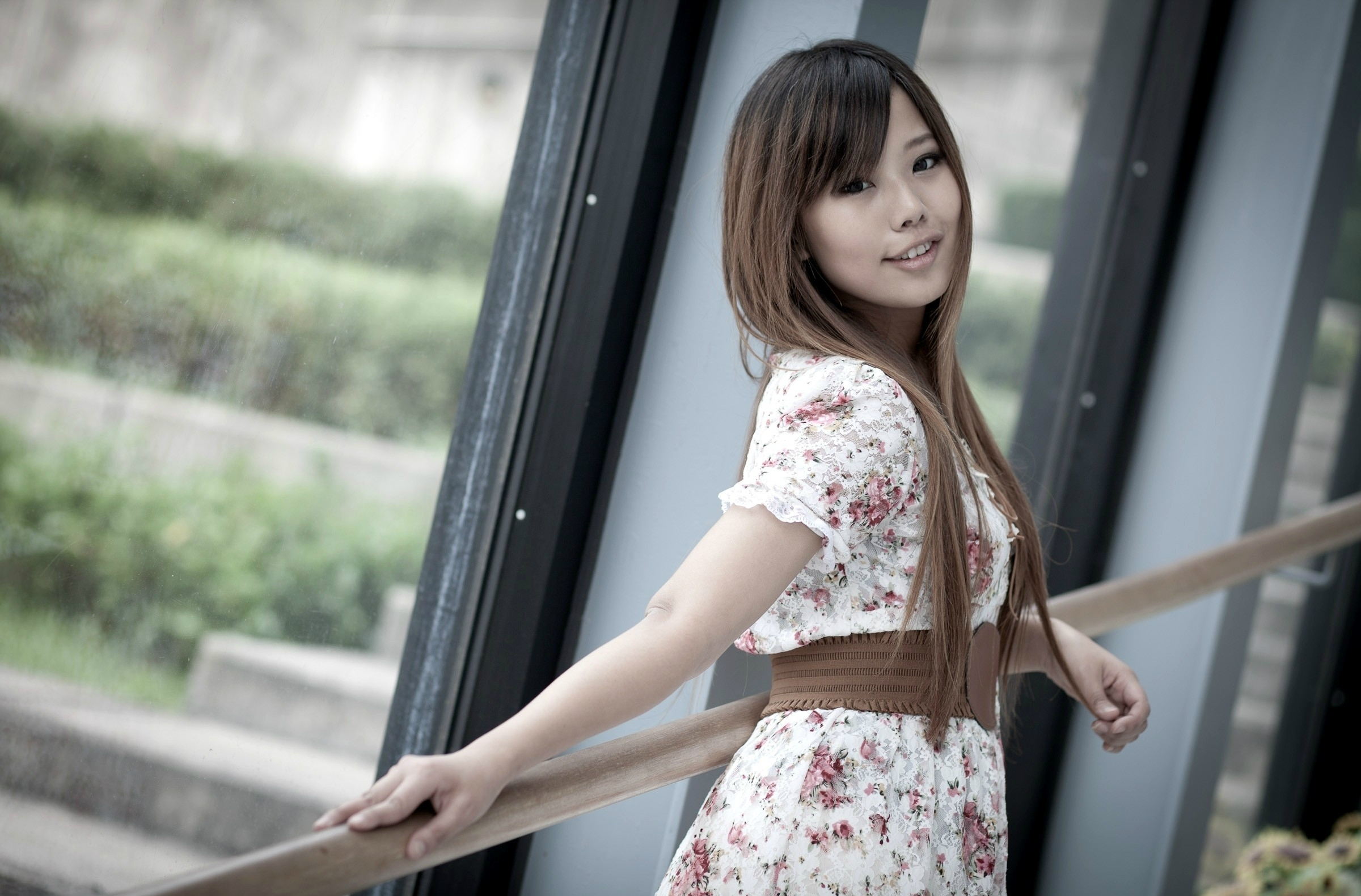 Asian woman on a stylish desktop wallpaper.