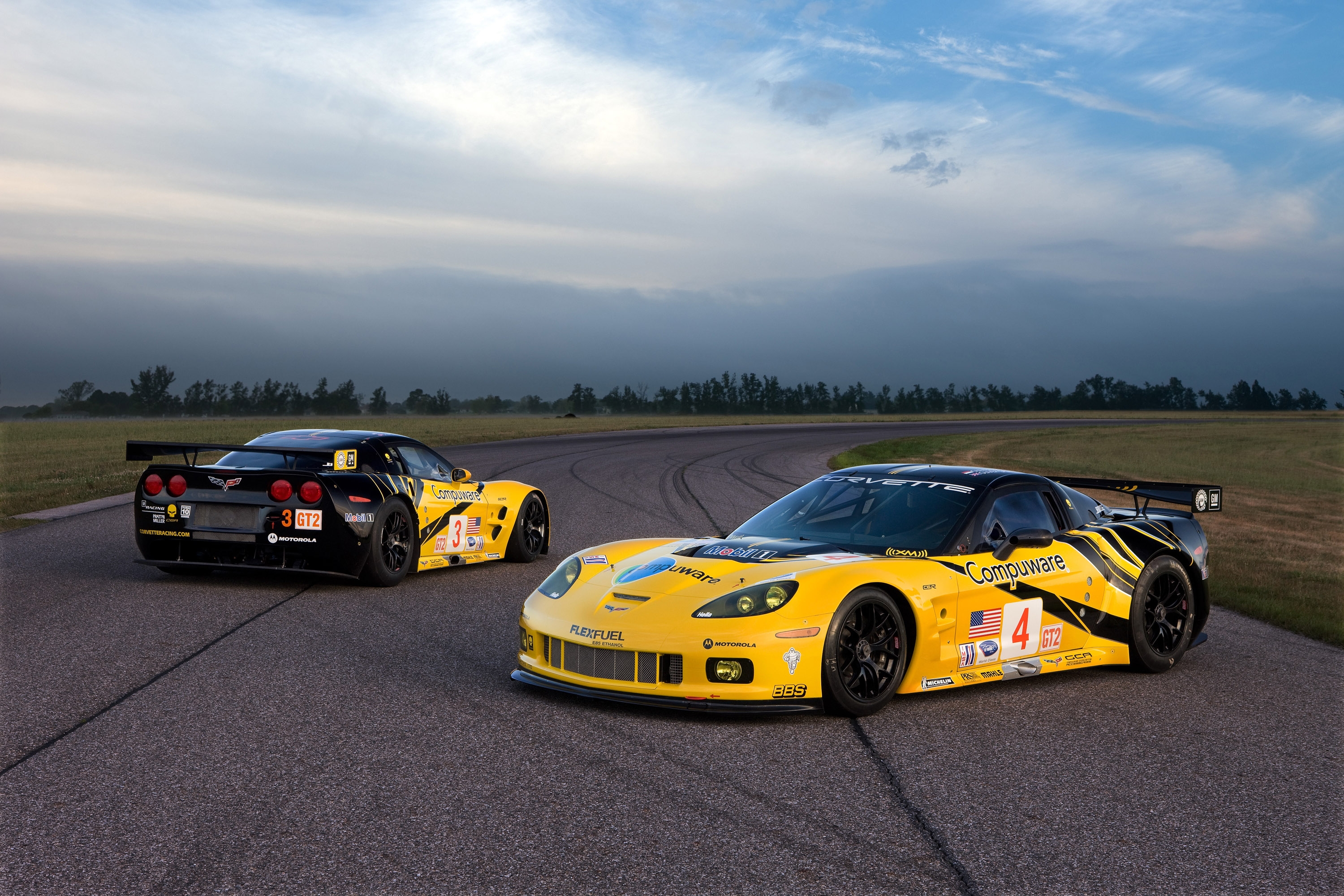 Corvette in motion: A sleek, powerful vehicle speeding on the road.