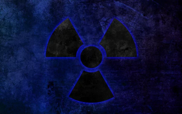 HD sci-fi desktop wallpaper featuring a bold, radioactive symbol set against a dark, textured, blue and black background.