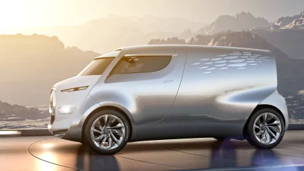 HD PC desktop wallpaper and background: 2011 Citroën Tubik concept vehicle — sleek silver futuristic van-like car against a mountain sunrise.