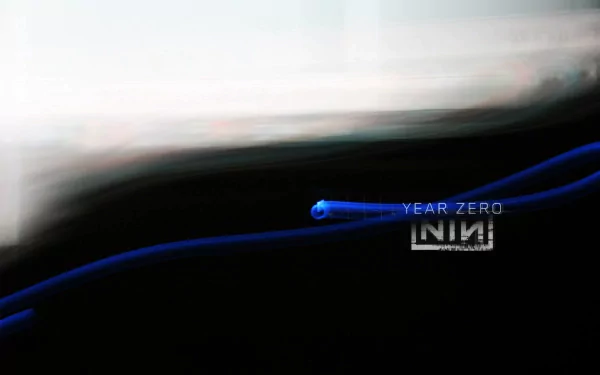 A dynamic HD wallpaper featuring abstract imagery and blue lines, representing Nine Inch Nails' Year Zero. It captures the essence of the band's unique style and sound.