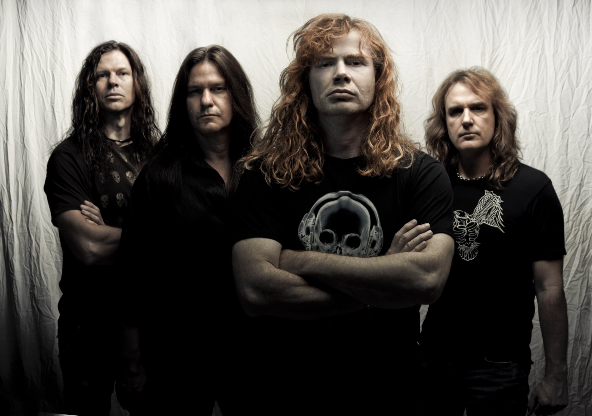 Megadeth band members pose together in a high-resolution 4K Ultra HD music-themed desktop wallpaper.