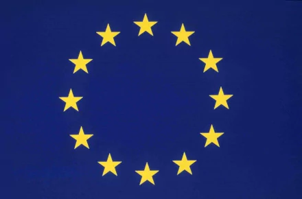 2K Quad HD PC desktop wallpaper of the European Union flag: twelve golden stars arranged in a circle on a deep blue background.