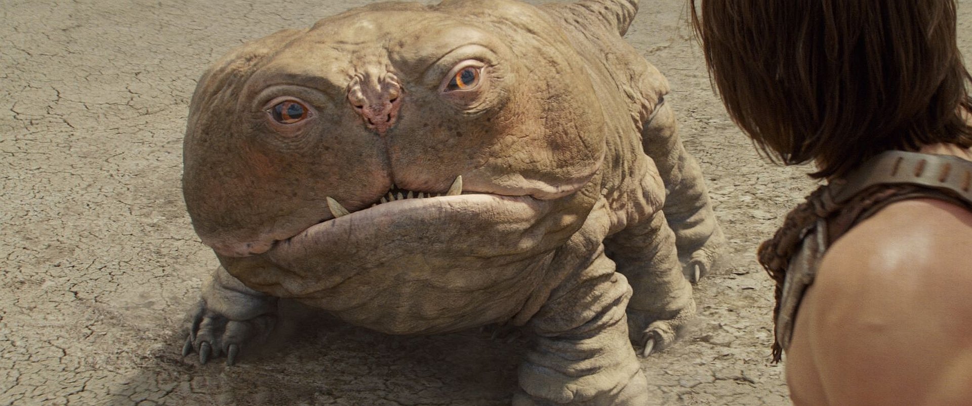 HD PC desktop wallpaper featuring a creature from the movie John Carter, showcasing detailed textures and a desert-like background.