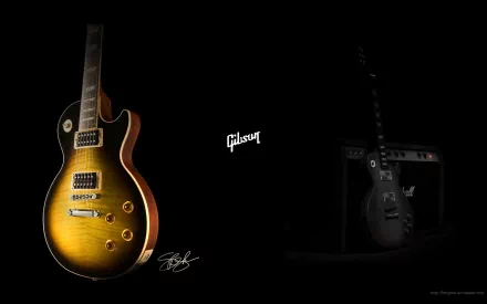 A stunning HD desktop wallpaper featuring a vibrant Gibson guitar against a dark backdrop, celebrating the artistry of music and guitar craftsmanship.