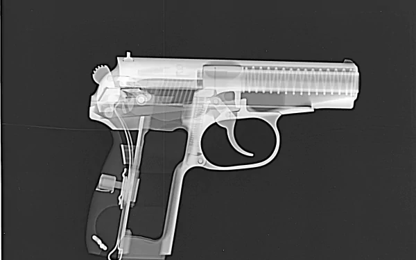 An X-ray image of a pistol, showcasing its internal components, presented as an artistic HD PC desktop wallpaper and background with military themes.
