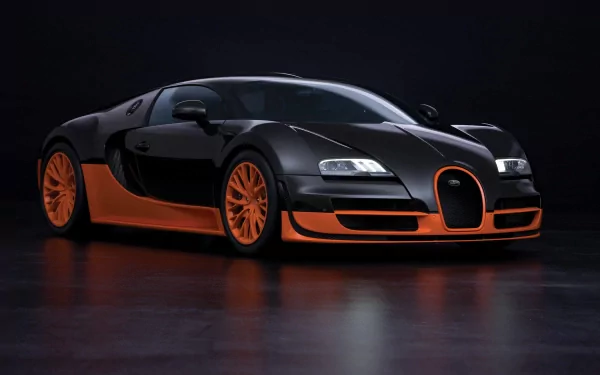 HD desktop wallpaper featuring a sleek Bugatti Veyron 16.4 Grand Sport with a black and orange color scheme on a dark reflective surface.