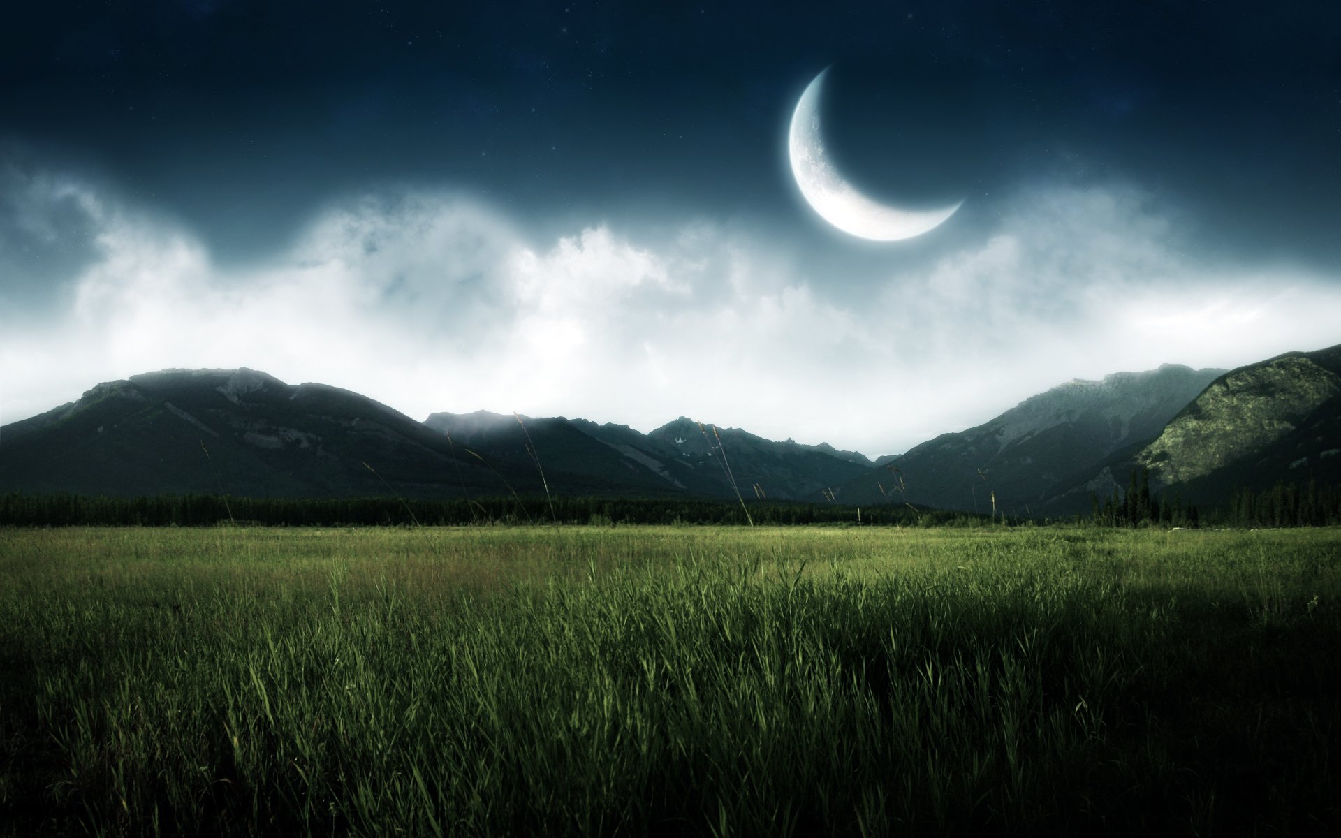 HD desktop wallpaper featuring a serene night scene with a crescent moon, clouds, and a dark blue sky over a green field, backed by cliffs and mountains.