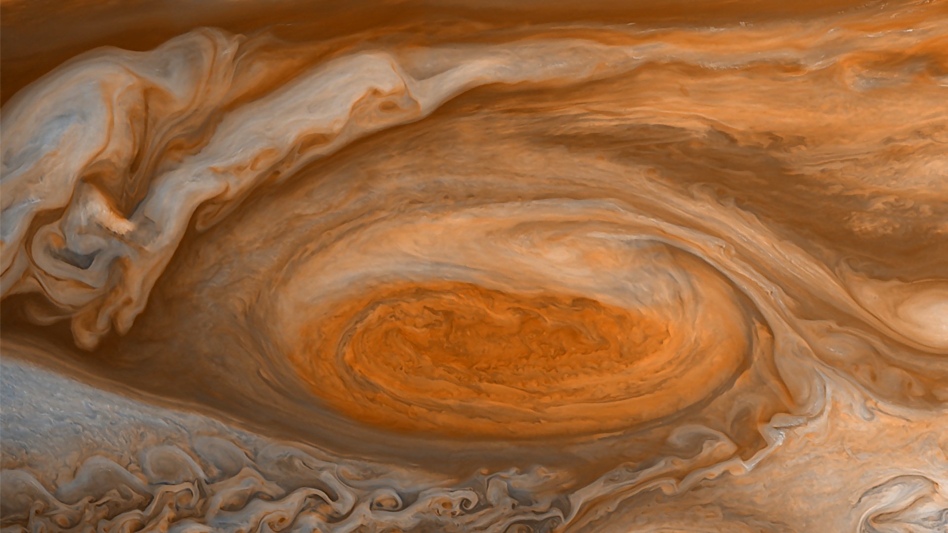 HD PC desktop wallpaper showcasing a detailed swirl on Jupiter's stormy atmosphere, capturing a sci-fi inspired view of the planet's iconic Great Red Spot.