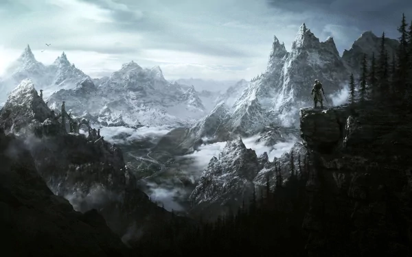 HD desktop wallpaper featuring a breathtaking view from The Elder Scrolls V: Skyrim. A lone figure stands on a cliff overlooking a vast, mountainous landscape covered in snow.