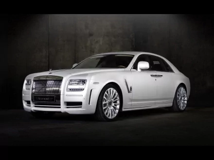 A sleek white Rolls-Royce parked against a dark background, showcasing its elegant design and luxurious features. High-definition wallpaper for a sophisticated look.
