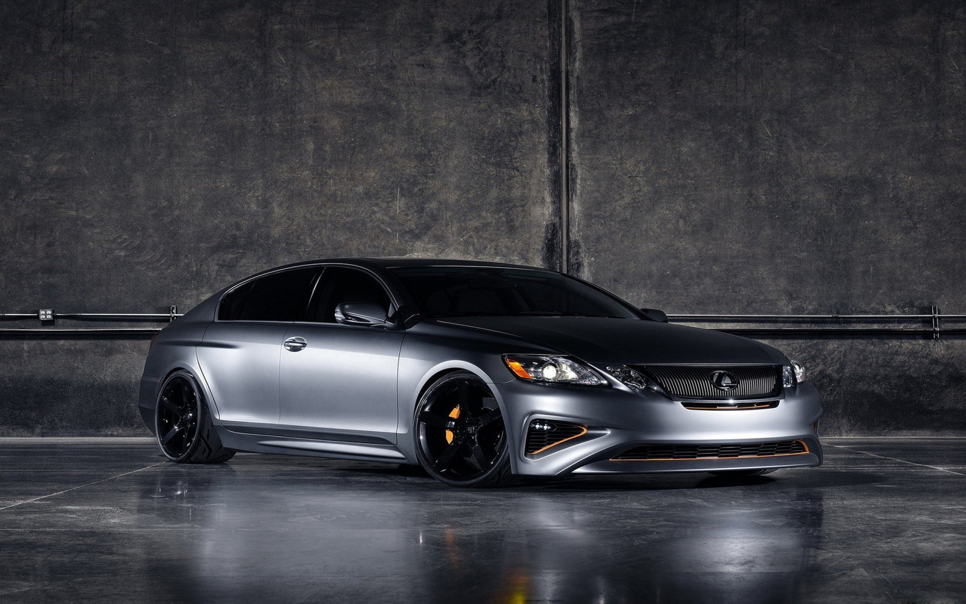 HD PC desktop wallpaper showcasing a sleek silver Lexus vehicle against a dark industrial backdrop.