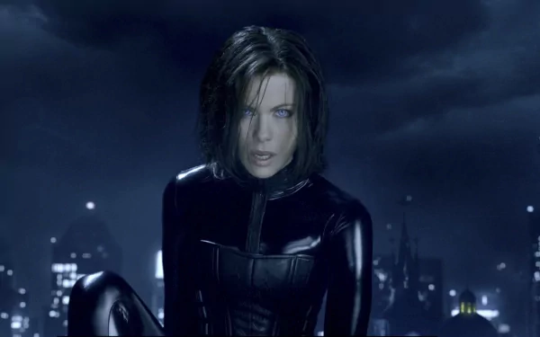HD PC desktop wallpaper featuring a dark, moody scene from the movie Underworld: Awakening with a focused female character in a black outfit against a cityscape at night.