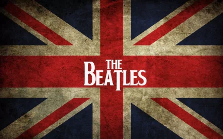 A high-definition desktop wallpaper featuring the iconic The Beatles logo overlaying a weathered Union Jack background, celebrating the band's British heritage and musical legacy.