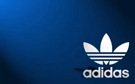 A sleek HD desktop wallpaper featuring a bold Adidas logo against a deep blue background, designed for a modern and stylish aesthetic.