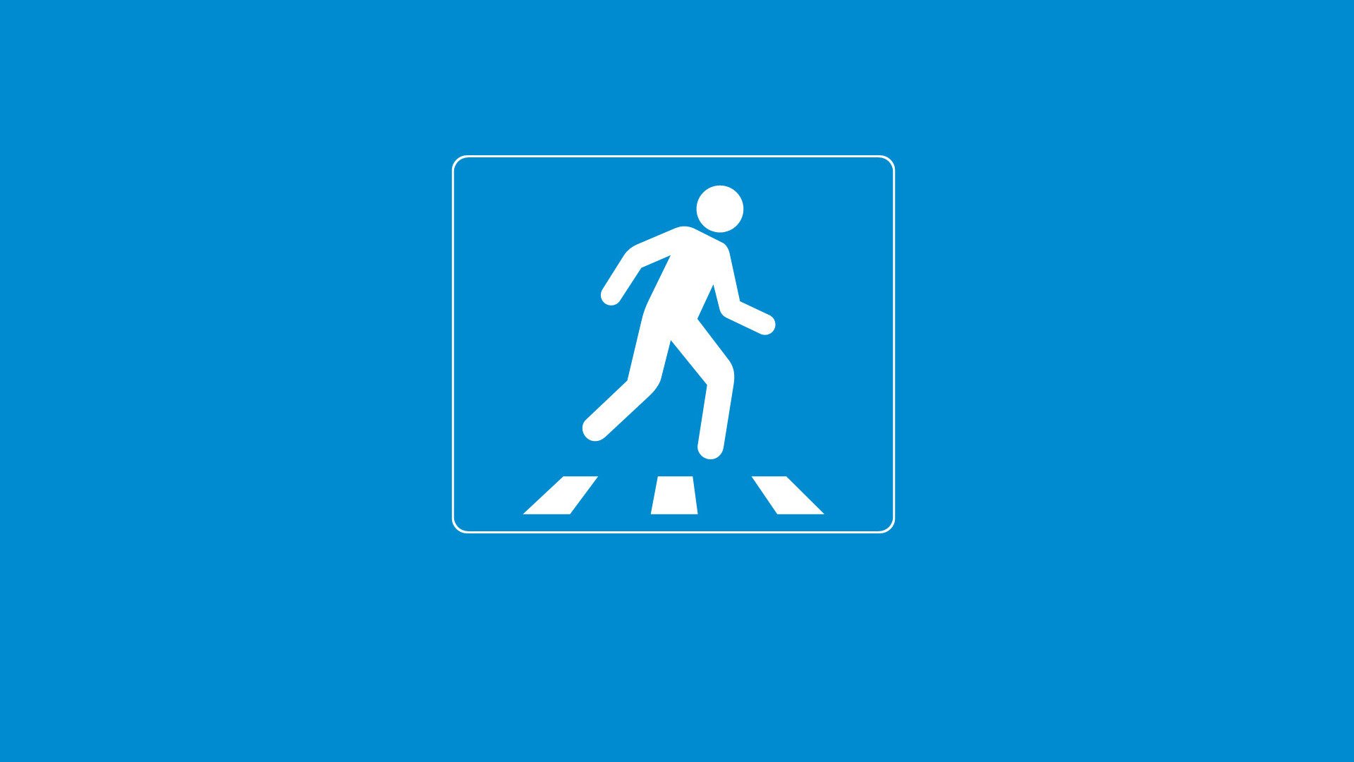 HD PC desktop wallpaper/background: white pedestrian-crossing sign (walking figure on zebra stripes) centered on solid bright blue background — miscellaneous sign graphic.
