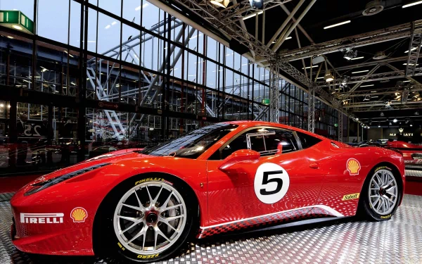 HD PC desktop wallpaper/background of a red racing vehicle (sports car) numbered 5, parked on a reflective showroom floor beneath industrial lighting.