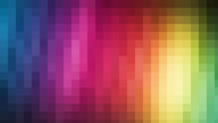 A vibrant HD desktop wallpaper showcasing colorful pixel art with a smooth gradient transitioning from blue to purple, red, orange, and yellow.