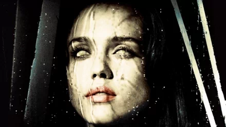 HD desktop wallpaper: close-up of a pale, rain-streaked woman with clouded white eyes, cinematic horror mood inspired by the movie The Eye.