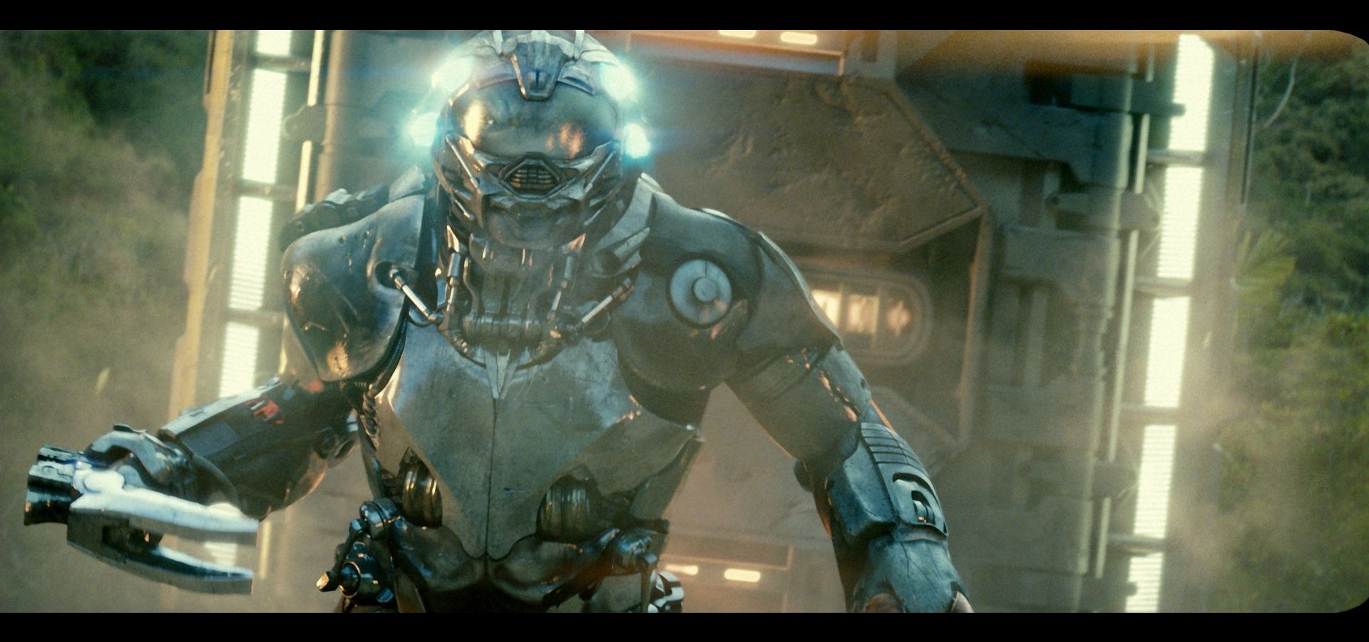 A futuristic battleship robot in a dramatic scene, featuring intricate armor and glowing lights, showcases intense action suited for a high-definition movie wallpaper.