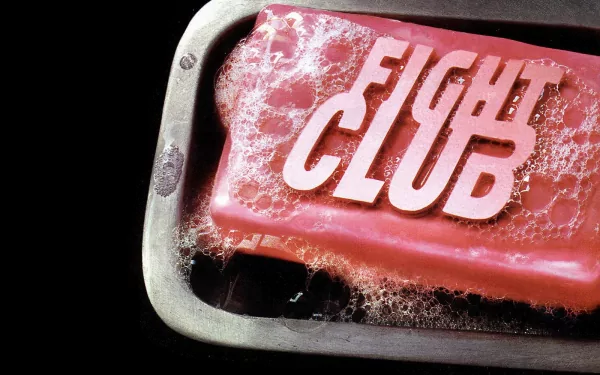 HD PC desktop wallpaper featuring a soap bar with the Fight Club movie title embossed, surrounded by bubbles, representing the iconic film.